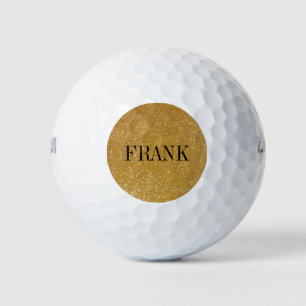 Personalised golf balls with gold glitter monogram