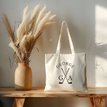 Personalised Golfer Gift Custom Name & Initials  Tote Bag<br><div class="desc">Carry your essentials in style with this personalised golf tote bag featuring crossed golf clubs, your name, and initials. A practical yet thoughtful gift for golfers, caddies, or golf enthusiasts, this tote is perfect for trips to the course, shopping, or everyday use. Customise it with any name and initials to...</div>