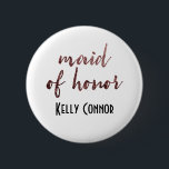 Personalised Maid of Honour Rose Gold Glitter 2 6 Cm Round Badge<br><div class="desc">The words "maid of honour" are rendered in a gorgeous, modern script font that has been embellished with faux rose gold glitter. Below, you can add a name. Name's font, size, colour and position can be adjusted if you wish. If it's preferable, you can even remove the name and re-position...</div>
