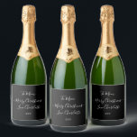Personalised Merry Christmas Black and White Sparkling Wine Label<br><div class="desc">This personalised Christmas design is in clic black and white with a modern, stylish, script typography. It has the message “To Mum Merry Christmas Love Charlotte xxx”. Perfect for gift giving with a personal touch. You can simply add both your name and your recipient’s name, by using the personalise this...</div>