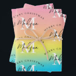 Personalised Merry Christmas Rainbow Monogram Wrapping Paper Sheet<br><div class="desc">A personalised "Merry Christmas" monogram design with a Xmas watercolor rainbow background colours. An ideal festive custom design for the holiday season. Customise the monogram and make it your own!</div>