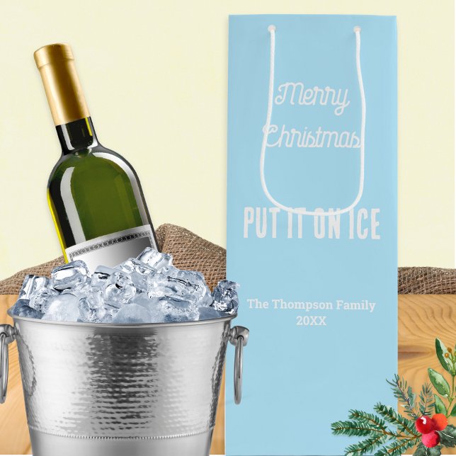 Personalised Merry Christmas White Wine Gift Bag (An attractive wine bottle bag in light blue, with Merry Christmas words and 'Put It On Ice' caption)
