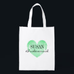 Personalised mint green heart bridesmaid wedding reusable grocery bag<br><div class="desc">Personalised mint green heart bridesmaid wedding grocery bag. Vintage heart icon with name and stylish script typography. Elegant wedding party favour gift for friends and family. Make your own for bride to be and bride's entourage; brides maid, maid of honour, flower girl, matron of honour, mother of the bride, mother...</div>