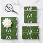 Personalised Modern Merry Christmas Green Monogram Wrapping Paper Sheet<br><div class="desc">A personalised modern "Merry Christmas" monogram design with a Xmas green background colour. An ideal festive custom design for the holiday season. Customise the monogram and make it your own!</div>