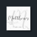 Personalised Modern Script Monogram & Family Name Canvas Print<br><div class="desc">Personalised Monogram and Family Name Gift featuring family name in grey modern script font style and monogram in light grey modern script font style as background with established year in grey sans serif font style on white marble background. Perfect as gift for newlyweds, holiday gift for family, family reunion favours...</div>