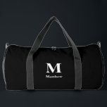 Personalised Monogram Name Black Duffle Bag<br><div class="desc">A custom monogram name black duffle bag. Perfect for carrying to the gym,  camping,  weekend trips,  or travelling.</div>