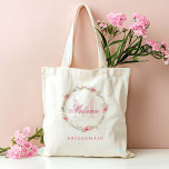 Personalised Monogram Pink Flowers  Tote Bag<br><div class="desc">The Personalised Monogram Pink Flowers Tote Bag is a beautifully elegant gift, perfect for bridesmaids or bachelorette celebrations. Featuring a delicate watercolor design with pink flowers and greenery, this tote can be customised with a letter and name for a personal touch. Its charming monogram and floral accents make it a...</div>