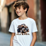 Personalised Monster Truck Name T-Shirt For Kids<br><div class="desc">Rev your little one's engine with a Personalised Name Monster Truck T-Shirt!
Put a smile on your child's face with a one-of-a-kind t-shirt featuring their name alongside awesome Monster trucks! Our custom tees are perfect for birthdays,  holidays,  or just because.</div>