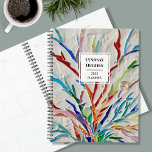 Personalised Mosaic Planner<br><div class="desc">This unique planner is decorated with a colourful mosaic.
Easily customisable with your name and year.
Use the edit option to change the text size, style, or colour.
Because we create our artwork you won't find this exact image from other designers.
Original Mosaic © Michele Davies.</div>