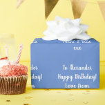 Personalised Name Modern Blue Happy Birthday Wrapping Paper<br><div class="desc">Personalised birthday gift wrap in pastel blue and white. It has a typography design with the message, “To Alexander Happy Birthday! Love from Mum and Dad xxx” in stylish white script typography and light blue background. To personalise, simply use the personalise this text button to add your name and who...</div>