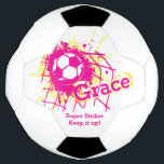 Personalised name soccer strike goal girls pink soccer ball<br><div class="desc">Yellow and pink football / soccer ball splatting in the net customised name ball. Perfect to inspire young female footballers and soccer players to keep it up. Personalise with your own name and message of encouragement. Currently reads Grace Super Striker Keep it up. Unique design by Sarah Trett.</div>
