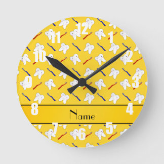 Personalised name yellow brushes and tooth pattern round clock
