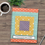 Personalised Patchwork 2023 Planner<br><div class="desc">This planner is decorated with a patchwork print in orange,  turquoise,  yellow,  and purple.
You can customise it by changing the photo to one of your own patchworks if you wish.
Change the name and year.
Use the Design Tool option to change the text size,  style,  or colour.</div>