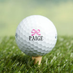 Personalised pink bow golf balls for women<br><div class="desc">Personalised pink bow golf balls for women. Customisable template with custom name or quote. Fun gift idea for golfers and golfing fans. Cute Birthday gift idea mum, wife, friends, team, group, teacher, top instructor, bride, bridesmaids, caddie, marshal, sister, daughter, kids etc. White or custom background colour. Example name: Paige. Available...</div>