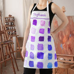 Personalised Purple Watercolor Artist Apron<br><div class="desc">This apron is decorated with a pattern of samples of watercolors in shades of purple. Perfect for an artist or someone who enjoys painting. Personalise this apron with your name or monogram. Because we create our on art work you won’t find this exact design from other designers. Original Watercolor ©...</div>