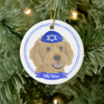 Personalised Red Apricot Gold Doodle Dog Hanukkah Ceramic Tree Decoration<br><div class="desc">Celebrate your favourite mensch on a bench with personalised ornament! This design features a sweet illustration of a red, apricot, or golden doodle dog with a blue and white yarmulke. For the most thoughtful gifts, pair it with another item from my collection! To see more work and learn about this...</div>