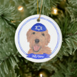 Personalised Red Apricot Gold Doodle Dog Hanukkah Ceramic Tree Decoration<br><div class="desc">Celebrate your favourite mensch on a bench with personalised ornament! This design features a sweet illustration of a red, apricot, or golden doodle dog with a blue and white yarmulke. For the most thoughtful gifts, pair it with another item from my collection! To see more work and learn about this...</div>