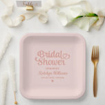 Personalised Rose Gold Pink Wedding Bridal Shower Paper Plate<br><div class="desc">Elegant custom wedding paper party plates feature a modern calligraphy script "Bridal Shower" design with cute heart accent. Personalise with the bride’s name and Future Mrs. name who the event is honouring. Clean and simple design. Note,  the rose gold and light pastel pink colour scheme can be modified.</div>