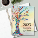 Personalised Rustic Planner<br><div class="desc">This unique Planner features a colourful mosaic tree on a watercolor background.
Easily customisable with your name and year.
Use the Design Tool to change the text size, style, or colour.
Because we create our artwork you won't find this exact image from other designers.
Original Mosaic © Michele Davies.</div>