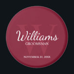 Personalised Script Groomsmen Name&Monogram Magnet<br><div class="desc">Add a personal touch to your wedding with personalised groomsmen magnet. This magnet features personalised groomsman's name in white classic script font style with wedding details in white classic serif font style and monogram in light burgundy red classic serif font style as background, on burgundy red background. Also perfect for...</div>