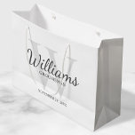 Personalised Script Groomsmen's name and Monogram Large Gift Bag<br><div class="desc">Add a personal touch to your wedding with personalised groomsmen gift bag. This gift bag features personalised groomsman's name in grey classic script font style with wedding details in grey classic serif font style and monogram in light grey classic serif font style as background, on white background. Also perfect for...</div>