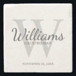 Personalised Script Groomsmen's name and Monogram Stone Coaster<br><div class="desc">Add a personal touch to your wedding with personalised groomsmen stone coaster. This coaster features personalised groomsman's name in grey classic script font style with wedding details in grey classic serif font style and monogram in light grey classic serif font style as background, on white background. Also perfect for best...</div>
