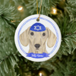 Personalised Smooth Cream Dachshund Dog Hanukkah Ceramic Tree Decoration<br><div class="desc">Celebrate your favourite mensch on a bench with personalised ornament! This design features a sweet illustration of a smooth tan cream dachshund dog with a blue and white yarmulke. For the most thoughtful gifts, pair it with another item from my collection! To see more work and learn about this artist,...</div>