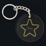 Personalised Star Keychain<br><div class="desc">For the movie buff... or for any shining star you may know... A black background with a gold star... and gold cursive lettering... personalised with a special name... Great little gift idea... party favour... for birthdays, celebrations, holidays and more... or add a touch of vintage charm to your own keyring......</div>