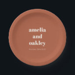 Personalised Terracotta Rust Fall Retro Wedding Paper Plate<br><div class="desc">Celebrate your big day with style using this modern terracotta wedding paper plate featuring bold,  minimalist typography and a warm earthy tone. Personalised with names and date,  it’s a perfect touch for rustic,  boho,  or outdoor receptions,  rehearsal dinners,  or engagement parties. A chic and practical choice for casual elegance.</div>