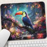 Personalised Toucan Paradise Mouse Pad<br><div class="desc">Escape to a tropical paradise with this personalised mouse pad featuring a vibrant toucan amidst lush jungle foliage. The colourful design and intricate details transport you to an exotic world, inspiring creativity and joy. Add a personal touch with your name or a favourite quote. The smooth surface ensures precise mouse...</div>