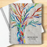 Personalised Tree Planner<br><div class="desc">This unique Planner is decorated with an original mosaic tree in bright colours on a grey background.
Easily customisable.
Use the Design Tool to change the text size,  style,  or colour.
As we create our artwork you won't find this exact image from other designers.
Original Mosaic © Michele Davies.</div>