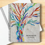 Personalised Tree Planner<br><div class="desc">This unique Planner is decorated with an original mosaic tree in bright colours on a grey background.
Easily customisable.
Use the Design Tool to change the text size, style, or colour.
As we create our artwork you won't find this exact image from other designers.
Original Mosaic © Michele Davies.</div>