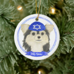 Personalised Tricolor Chihuahua Hanukkah Ceramic Tree Decoration<br><div class="desc">Celebrate your favourite mensch on a bench with personalised ornament! This design features a sweet illustration of a tricolor long haired chihuahua dog with a blue and white yarmulke. For the most thoughtful gifts, pair it with another item from my collection! To see more work and learn about this artist,...</div>