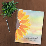 Personalised Watercolor Sunflower 2023 Planner<br><div class="desc">This colourful 2023 Planner is decorated with a yellow watercolor sunflower and stylish script typography. Easily customisable with your name, and year. Use the Customise Further option to change the text size, style, and colour. Because we create our artwork you won't find this exact image from other designers. Original Watercolor...</div>