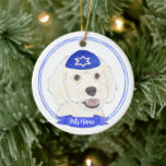 Personalised White Doodle Dog Hanukkah Ceramic Tree Decoration<br><div class="desc">Celebrate your favourite mensch on a bench with personalised ornament! This design features a sweet illustration of a white doodle dog with a blue and white yarmulke. For the most thoughtful gifts, pair it with another item from my collection! To see more work and learn about this artist, visit her...</div>