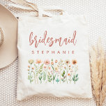 Personalised Wildflowers Rose Script Bridesmaid Tote Bag<br><div class="desc">This simple,  elegant tote bag features a border of wildflowers in shades of pink and peach with green stems. The word "bridesmaid" appears in dusty rose handwriting script. Personalise it with her name in sans serif font. Makes a perfect bridesmaid gift!</div>