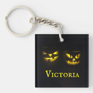 Personalised yellow and black creepy pumpkin face key ring