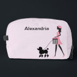 Personalize Woman in pink walking black poodle  Dopp Kit<br><div class="desc">Personalize this woman in pink with a beret walking a black poodle and add a name.</div>