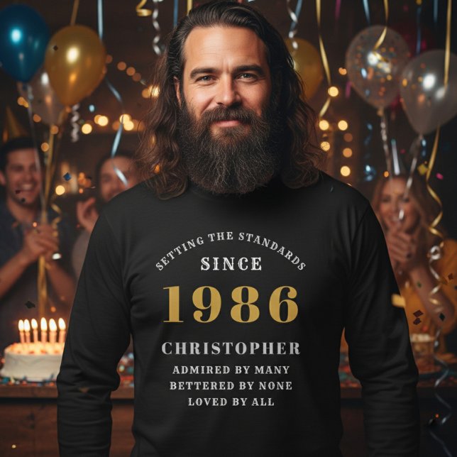 Personalized 40th Birthday 1986 Add Name T-Shirt (Born 1986 long sleeve birthday t-shirt. Party background out of focus.)