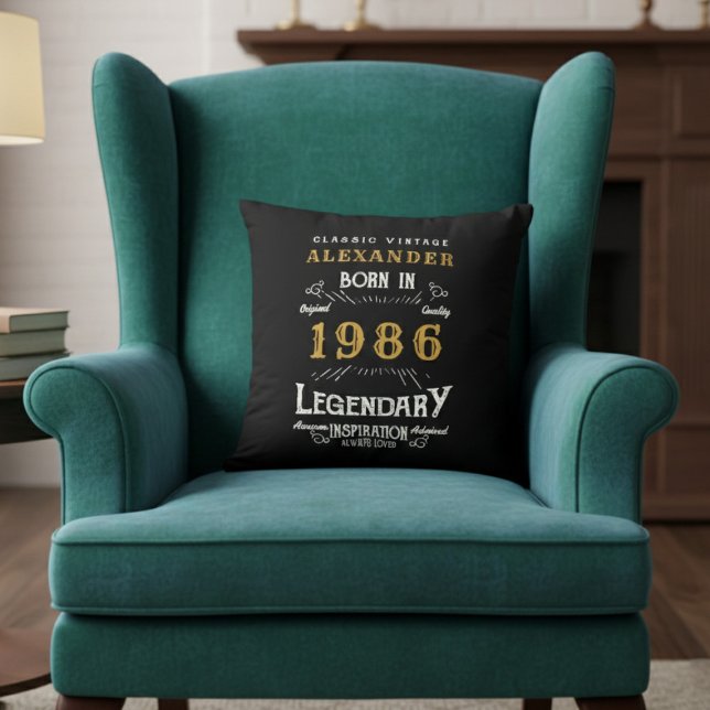 Personalized 40th Birthday Born 1986 Legend Black Cushion (Born 1986 throw pillow on a green chair.)