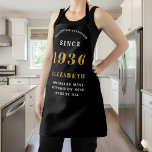 Personalized 90th Birthday 1936 Black & Gold Apron<br><div class="desc">Celebrate nine decades of fabulousness with our stylish and personalized 90th Birthday Apron! This elegant black apron features a bold "SETTING THE STANDARDS SINCE" design with a prominent "1936" (or your chosen year) in gold. Below, you can customize it with a name like "ELIZABETH" and a heartwarming phrase: "ADMIRED BY...</div>