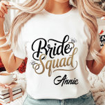 Personalized Gold Bride Squad Bachelorette Party Tri-Blend Shirt<br><div class="desc">Celebrate the bride-to-be in style! This elegant "Bride Squad" t-shirt features a chic gold-effect script with sparkling diamond ring accents, perfect for a modern bachelorette party, bridal shower, or wedding rehearsal. Make your bridal party stand out with this coordinated and glamorous look. Matching designs for the Bride and Maid of...</div>