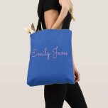 Personalized Name Blue Pink Bridesmaid Favor Tote Bag<br><div class="desc">This eye-catching tote features a bold royal blue background with a soft pink handwritten script for your custom name. Ideal for everyday errands,  books,  or gifting,  this personalized bag adds a stylish touch to any outing. Great for students,  bridesmaids,  or anyone who loves functional fashion.</div>