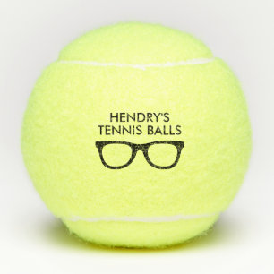 Personalized tennis balls printed with funny specs