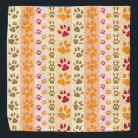 Pet Prints Bandana<br><div class="desc">A Bright and Colourful Orange Print of Paws Will Look Great On A Lab or Golden Retriever Dog.</div>