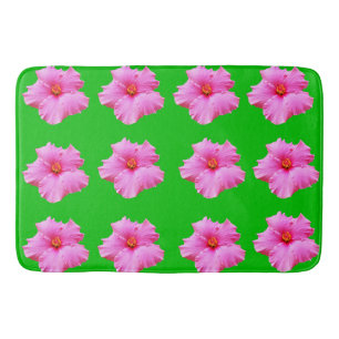 "Petal Serenity: Pink Hibiscus on a Green Canvas Bath Mat