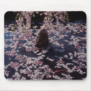 Petals floating on fish pond mouse pad
