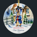 Peter rabbit winter first Christmas gifts photo Ceramic Tree Decoration<br><div class="desc">Peter rabbit winter themed first baby's Christmas gifts personalised ornament,  a cute bunny in a blue jacket in front of snowy winter cottage for baby keepsake Christmas gift</div>