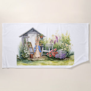 Peter the rabbit and his garden shed beach towel