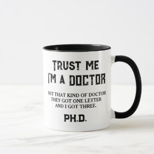 PHD Graduate Funny Quote Not That Kind Of Doctor Mug